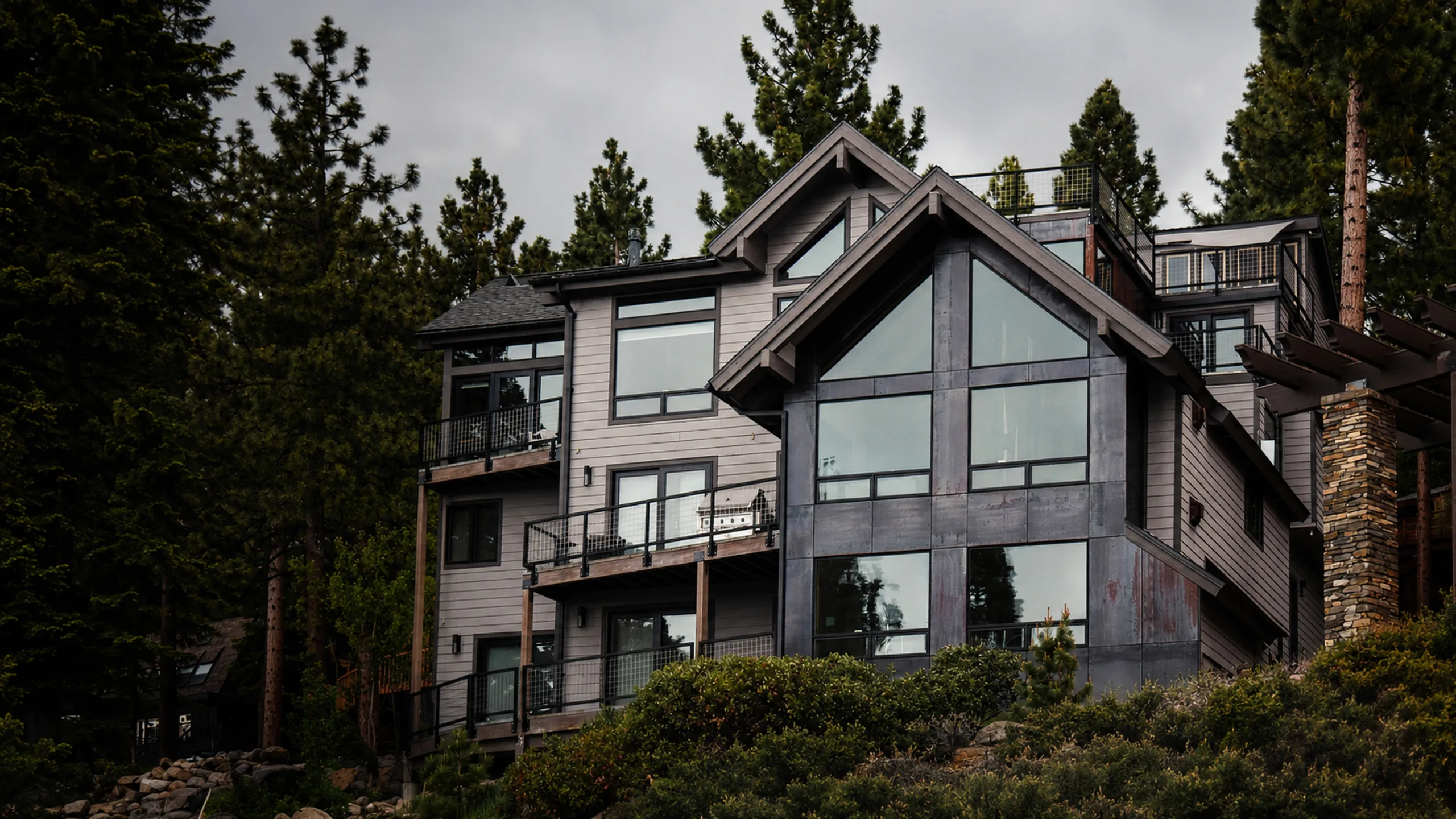 Multi-level renovated home under construction with active exterior work